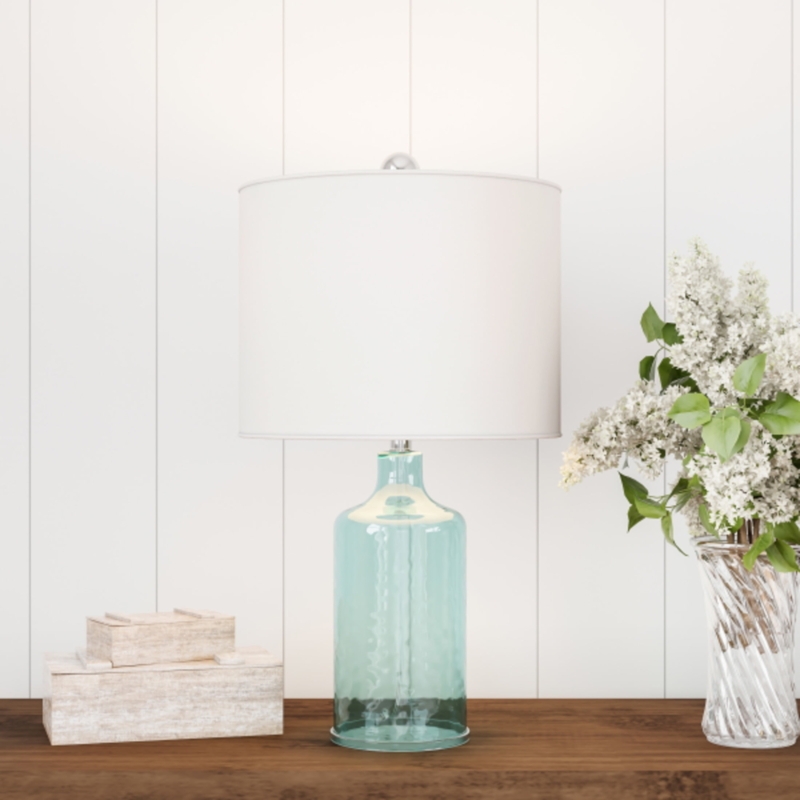 Table Lamp: Translucent Blue Glass Bottle Silhouette for Coastal Bedroom