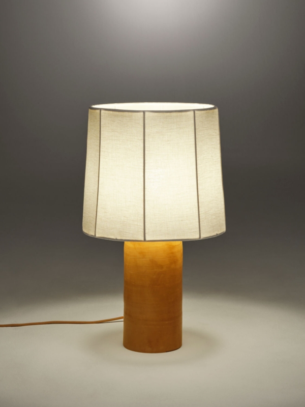 Table Lamp with Bulbous Organic Base and Pitted Stone Texture.