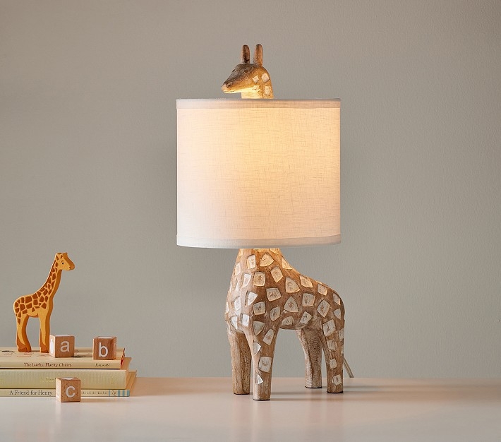 Table Lamp with Carved Wood Toned Giraffe Base and Drum Shade.