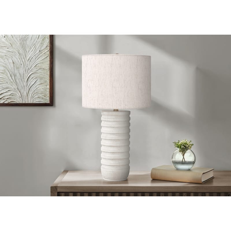 Transitional Table Lamp, Textured Resin Base with Dark Metal Accents.