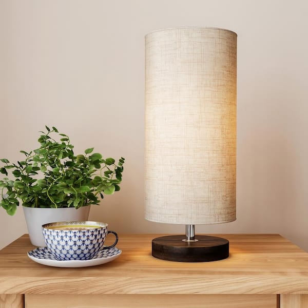 Tripod Table Lamp with Adjustable Wood Base and Linen Shade.