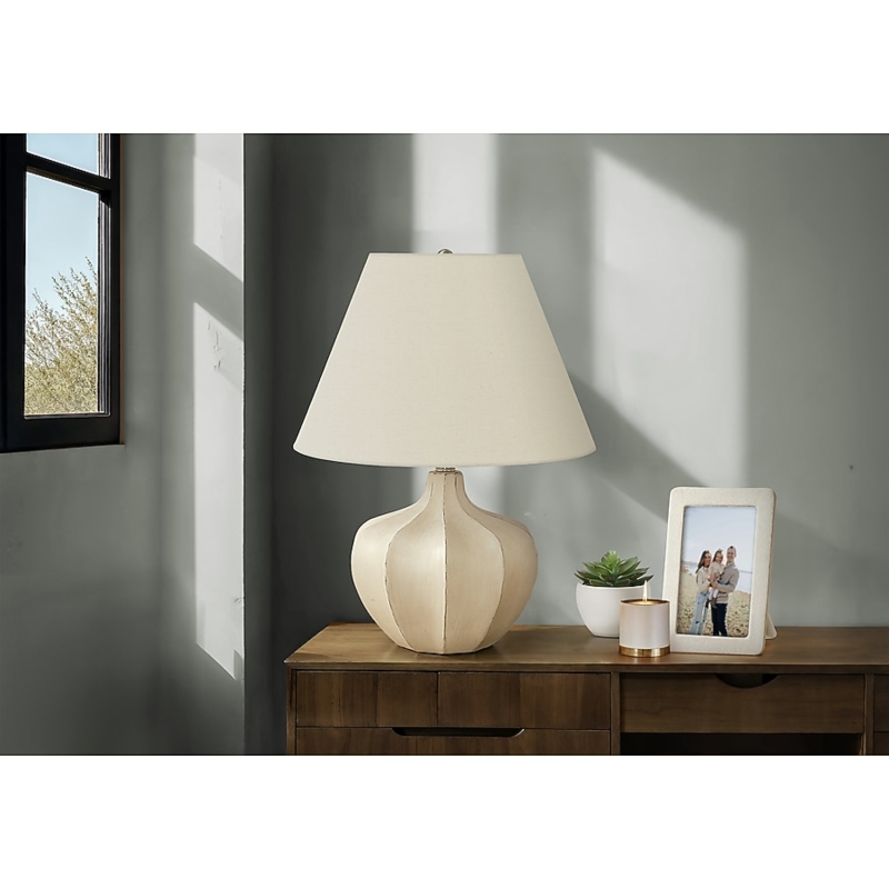 Urn Table Lamp with Pitted Resin Texture and Distressed Finish for Entryway.
