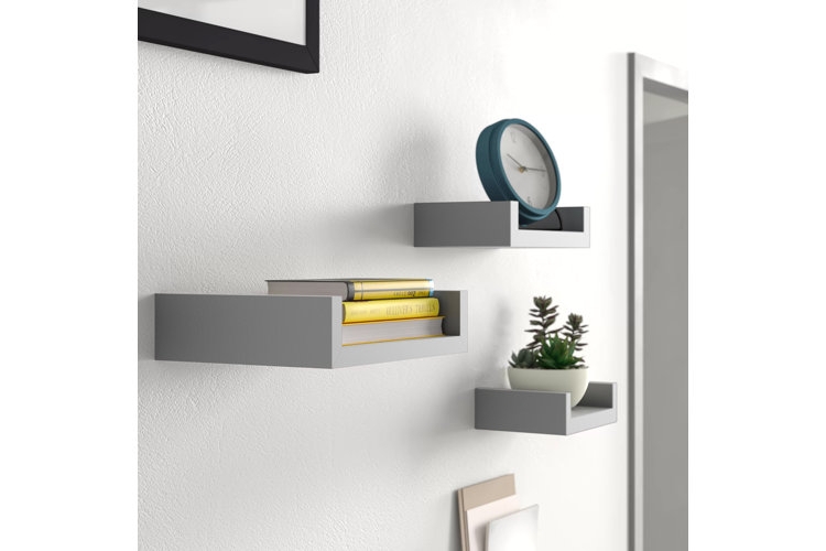 Wall Shelf: Cube Silhouette in Wood Toned Finish against Botanical Wallpaper