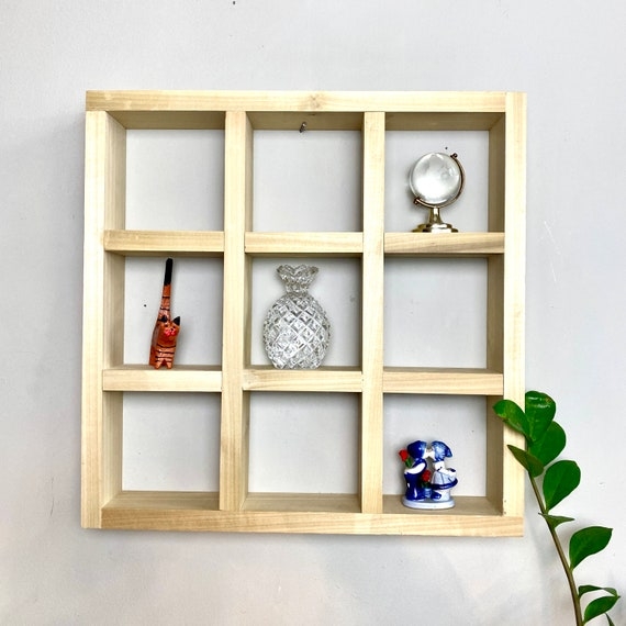 Wall Shelf with Nine Cube Grid Layout in Light Poplar Wood