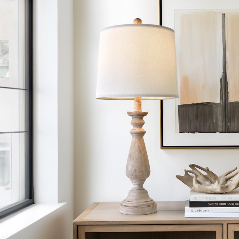 Wood-Toned Table Lamp with Ribbed Gourd Base and Drum Shade.