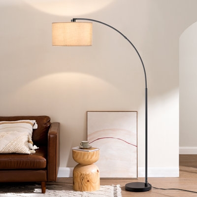 Arched Floor Lamp: Overhanging Silhouette with White Drum Shade