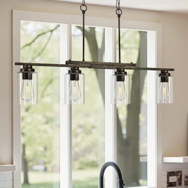 Black And Gold Linear Pendant Light Featuring Antique Gold Sockets