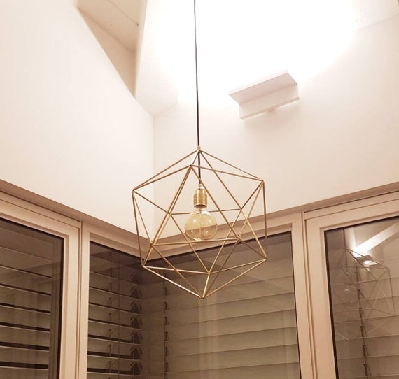 Chandelier Intersecting Rod Design Brushed Brass White Glass Globes