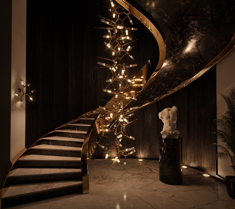 Chandelier Three-Tiered Polished Gold with Glass Shard Elements.