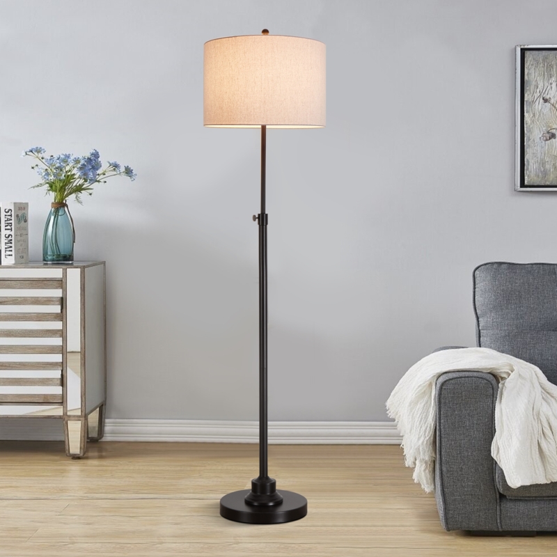 Contemporary Silver Floor Lamp with Slender Profile and Neutral Fabric Drum Shade