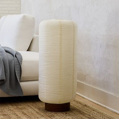 Floor Lamp: Japandi Style Pleated Drum Shade, Light Wood Tripod Base.