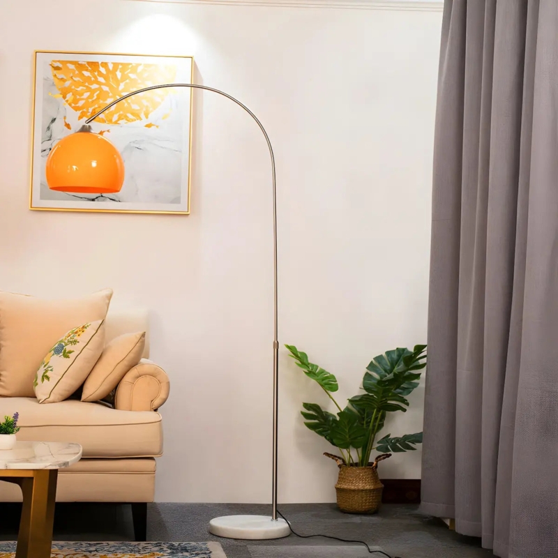 Floor Lamp Orange Dome Shade Stone Base Arched Silhouette Minimalist
