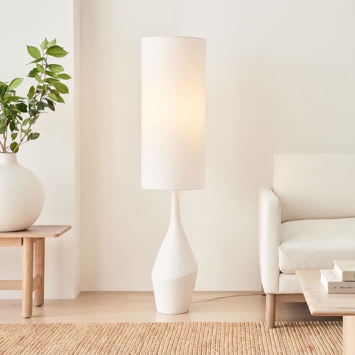 Floor Lamp: Sculptural Asymmetric Ceramic Base with Linen Shade