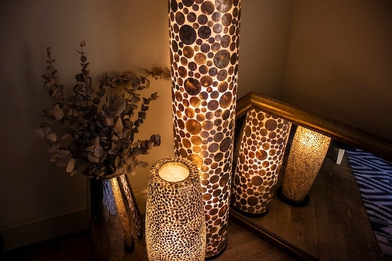 Floor Lamp: Tiered Shade of Overlapping Translucent Shell-Like Discs