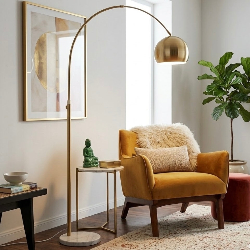 Floor Lamp with marble base, arched arm, and polished brass finish.