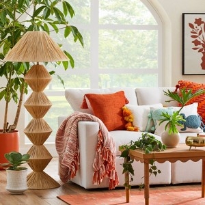 Floor Lamp with Sculptural Tiered Base and Woven Raffia Texture