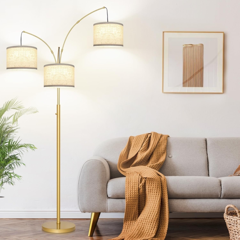 Modern Gold Arc Floor Lamp with Staggered Drum Shades and Polished Finish