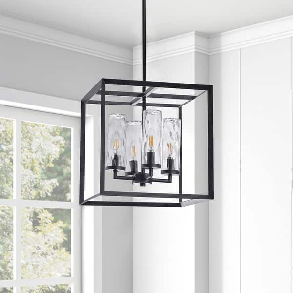 Open Geometric Pendant Over Dining Table With Metal Silhouette