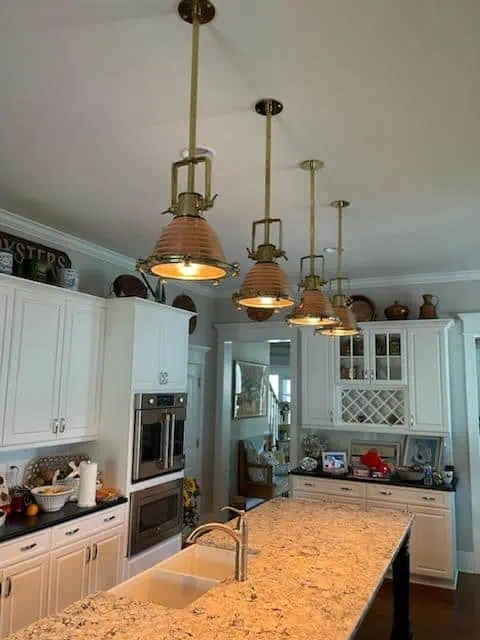 Pendant Light Trio Linear Arrangement Brass Clamshell Cages Nautical
