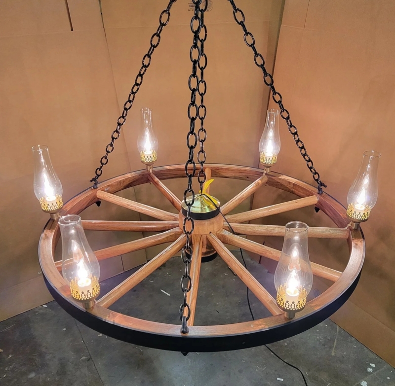 Rustic Black Wagon Wheel Chandelier with Unique Rope Suspension