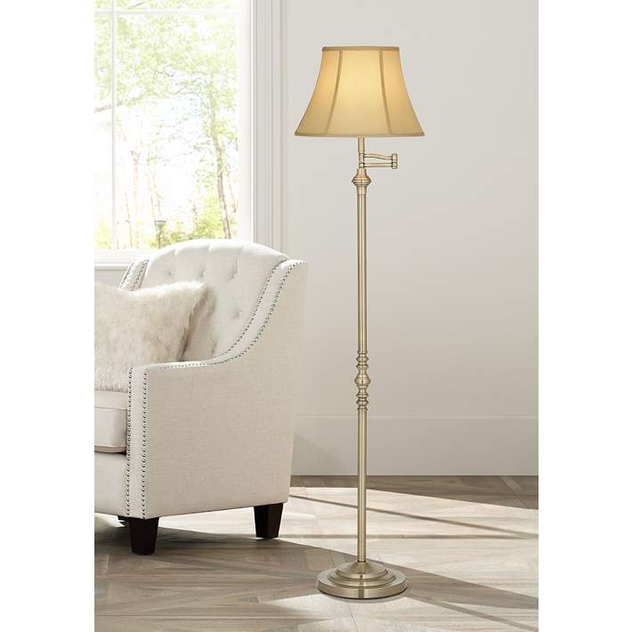Traditional Floor Lamp Featuring Fluted Column and Ornate Tiered Base