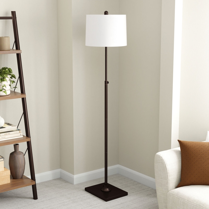 Transitional Floor Lamp with Antiqued Bronze Finish and Tapered White Drum Shade