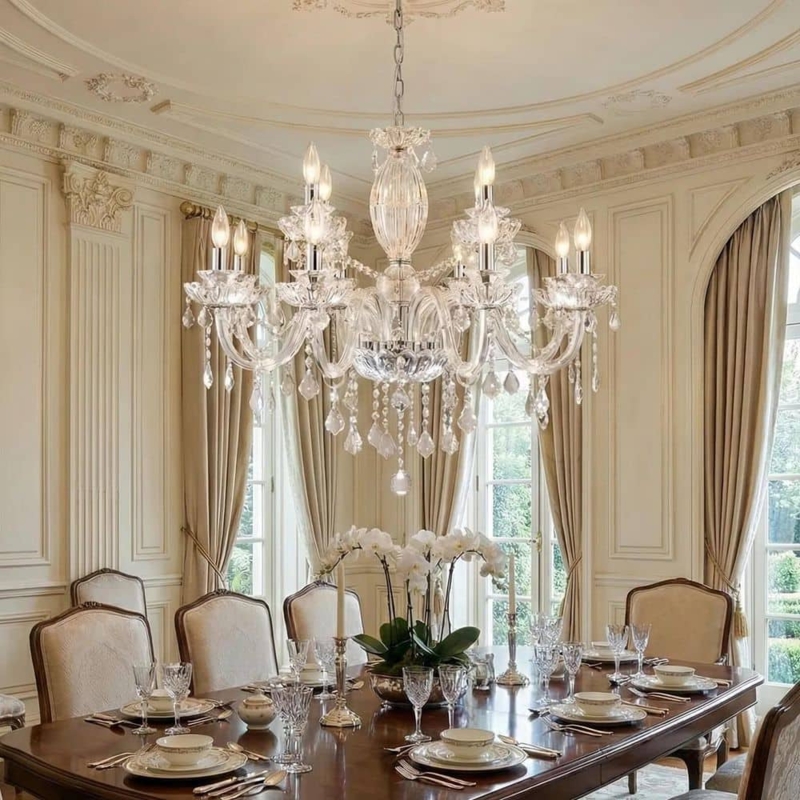 Twelve Light Chrome Chandelier with Tiered Crystal Cascades.