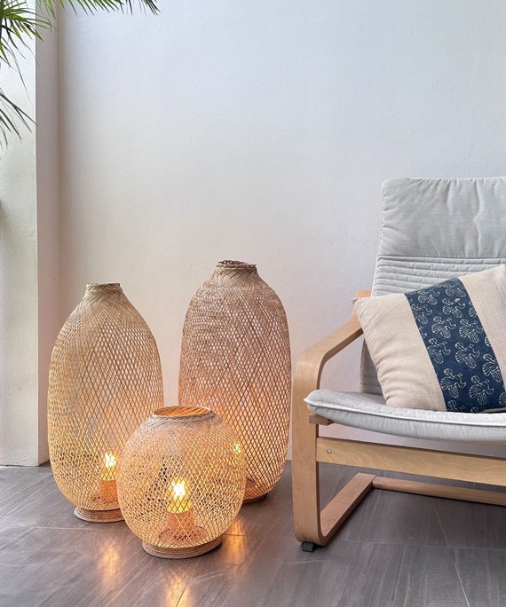 Woven Floor Lamp with Rustic Fish Trap Design and Tapered Silhouette