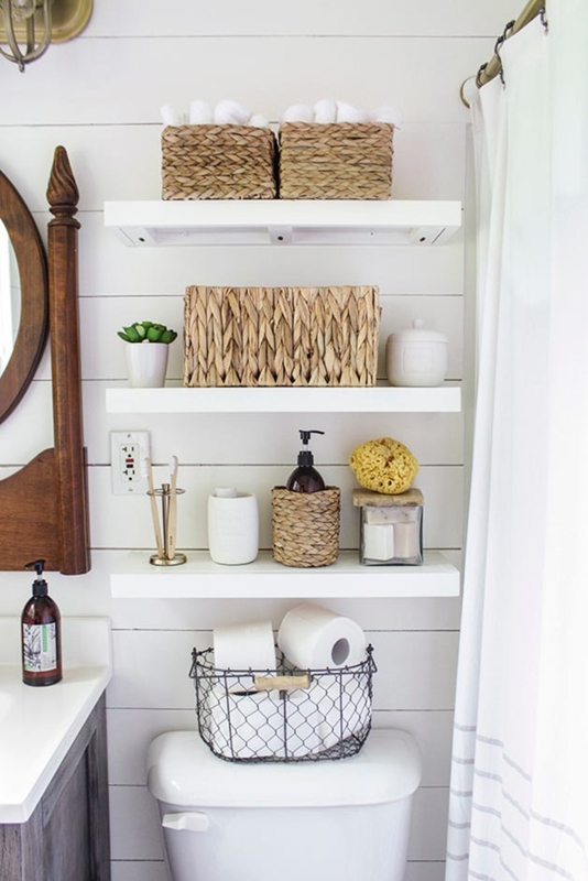 Above-Toilet Floating Shelves on White Shiplap Wall with Baskets