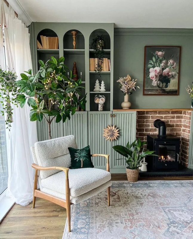 Accent Chair in Sage Green Arched Built-In Shelving Nook