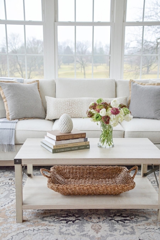 Airy Farmhouse Living Room with Light Wood Coffee Table with Shelf