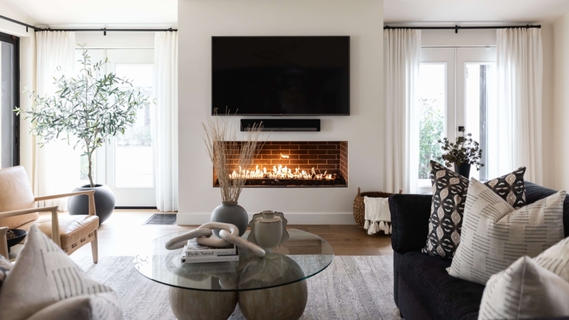 Airy Living Room Design Linear Fireplace Sculptural Coffee Table