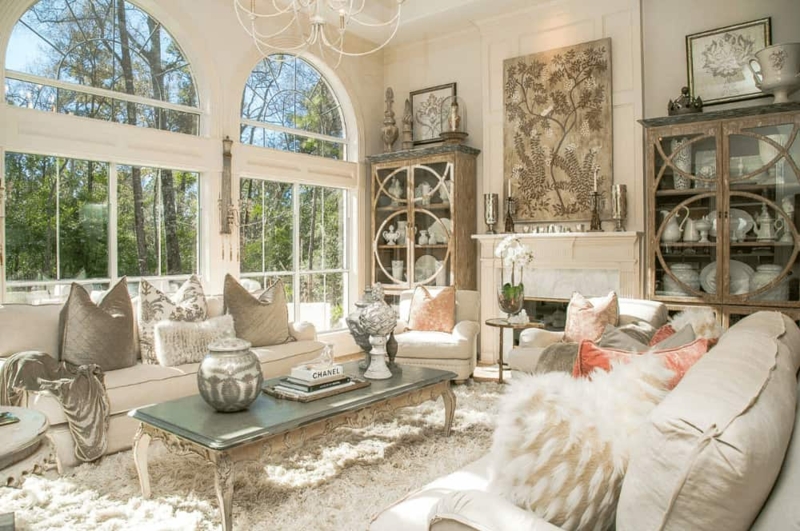 Airy Living Room with Arched Windows & Distressed Cabinets Decor