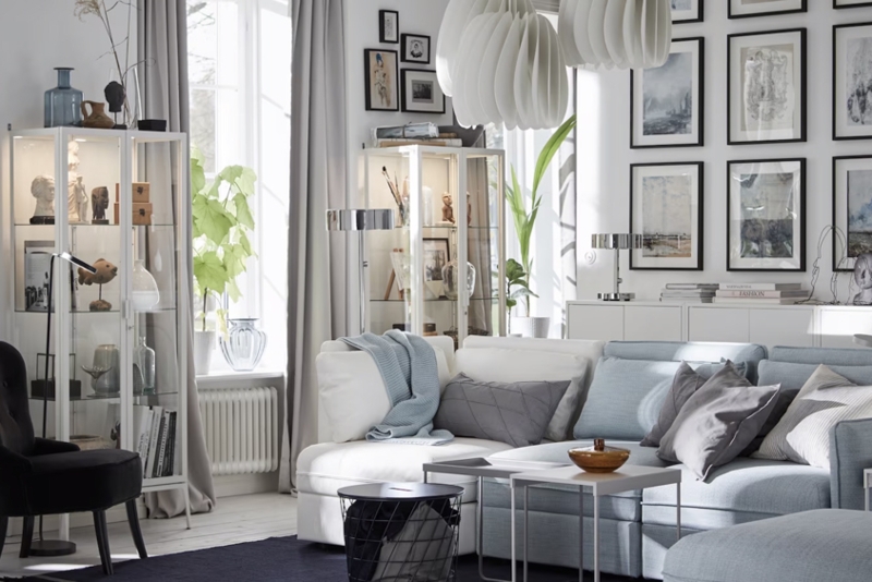 Airy Lounge with Pleated Pendants and Light Blue Sectional Sofa