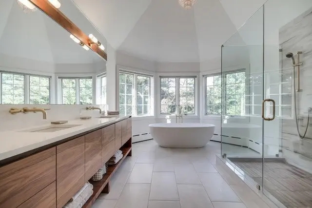Airy Master Bathroom Design with Vaulted Ceiling & Wood Vanities