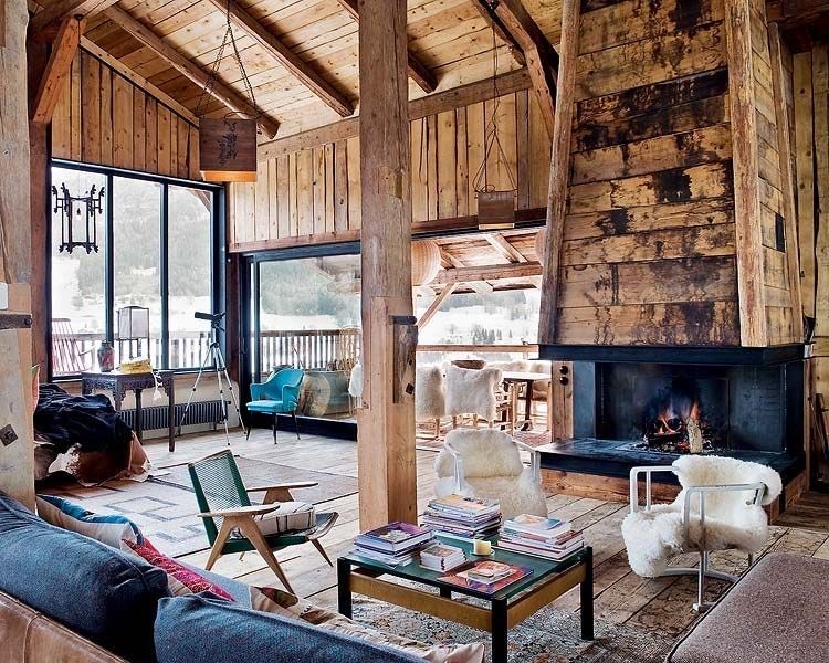 Alpine Rustic Living Room with Wood Clad Fireplace and Shaggy Chairs