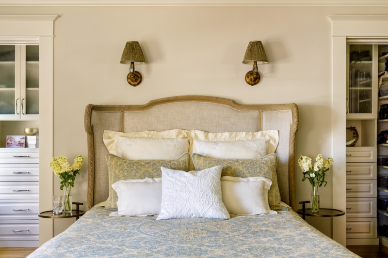 Arched Upholstered Headboard with Symmetrical Built-In Closets