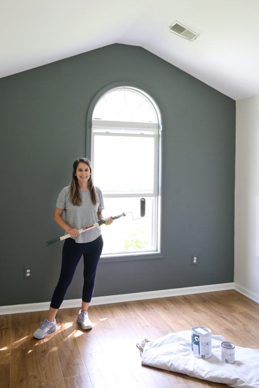 Arched Window Set in a Charcoal Accent Wall with Vaulted Ceiling