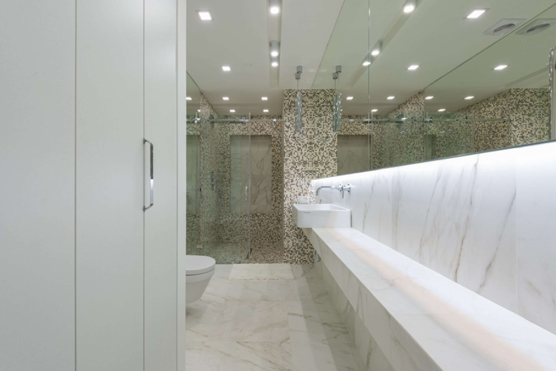 Architectural Recessed Lighting with Mosaic Tile Accent Wall