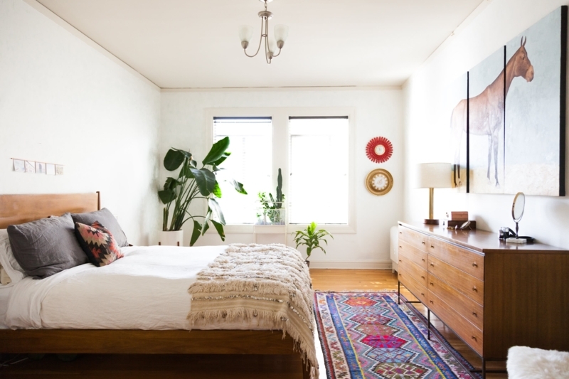 Area Rug: Colorful Kilim Style in Mid-Century Modern Bohemian Bedroom.