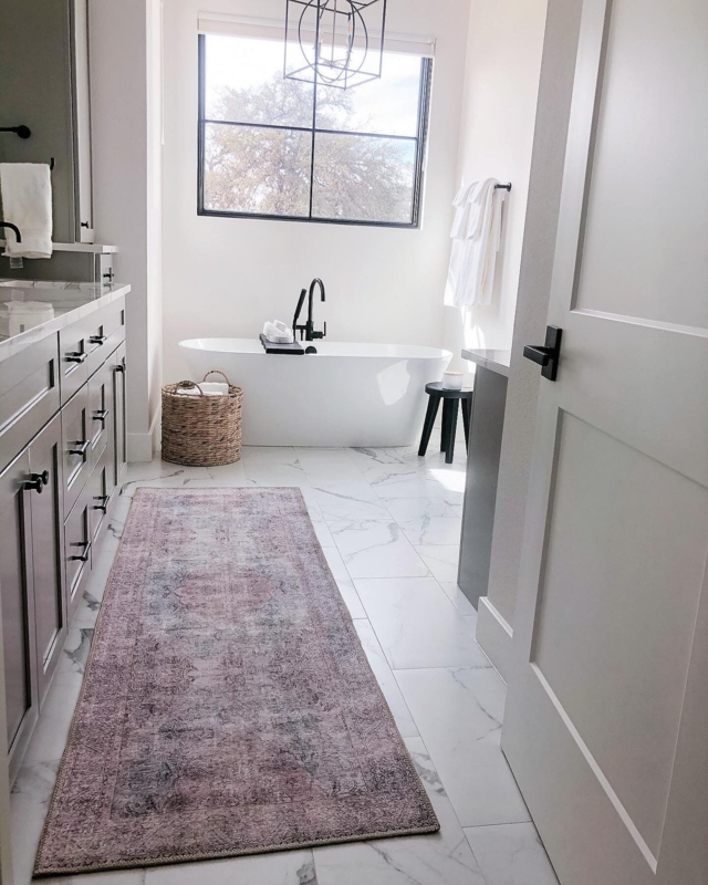Area Rug: Distressed Runner on Marble Tile Floor with Black Hardware