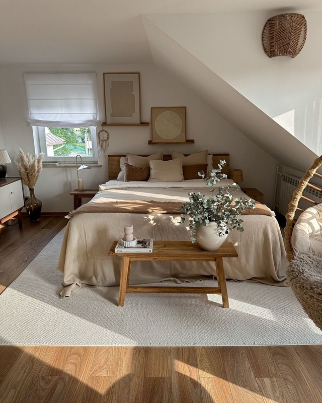 Area Rug in Textured Ivory felt in Cozy Slanted Ceiling Attic Bedroom.