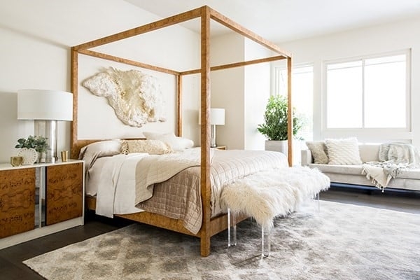 Area Rug with Diamond Pattern under Modern Canopy Bed Frame.