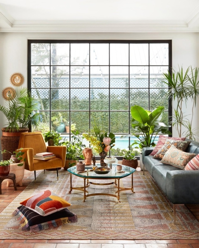 Area Rug with Geometric Pattern and Mustard Velvet Chair