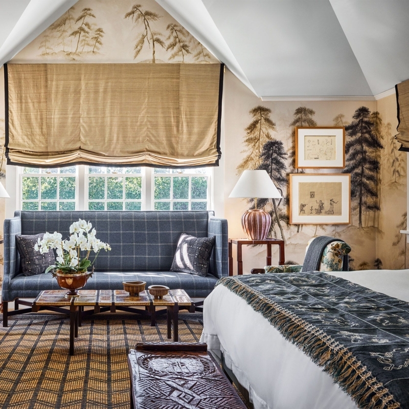 Area Rug with Grid Pattern in Bedroom featuring Tree Mural Wallpaper.