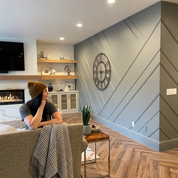 Asymmetrical Geometric Accent Wall Wrapping Around Corner