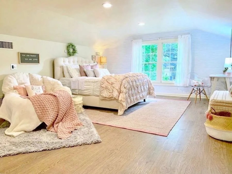 Attic Bedroom Layout Ideas: Sloped Ceiling & Pink Saucer Chair