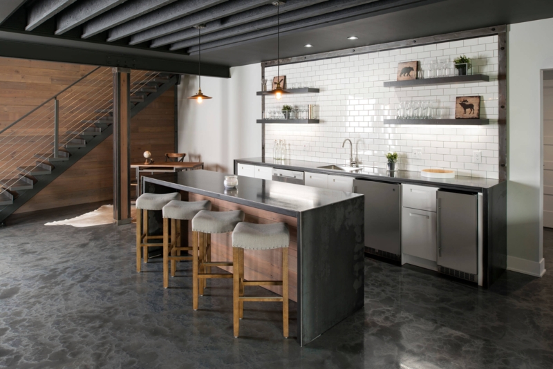 Bar Area with Metal Waterfall Island Counter and Subway Tile Backsplash