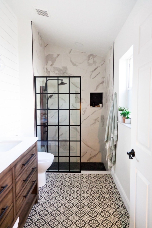 Bathroom Design with Black Grid Shower Door and Geometric Floor