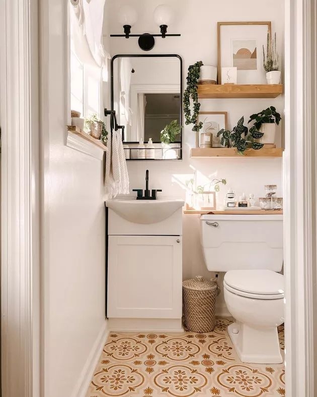 Bathroom: Patterned Floor Tile, Tiered Floating Shelves, Black Accent Fixtures